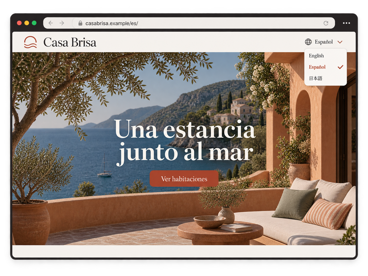 Fictional Casa Brisa hotel website in Spanish, with a localized URL and a language menu offering English, Spanish and Japanese.
